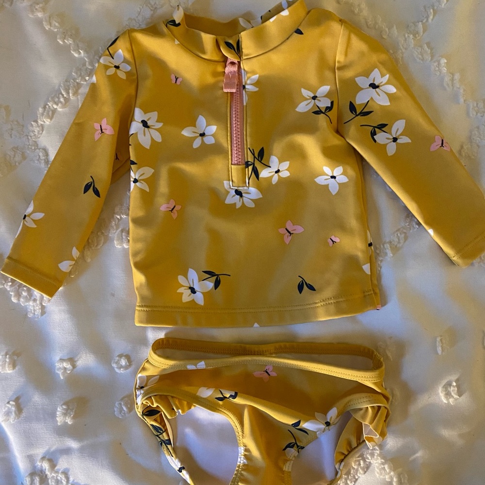 Carter’s baby girl’s rash guard suit